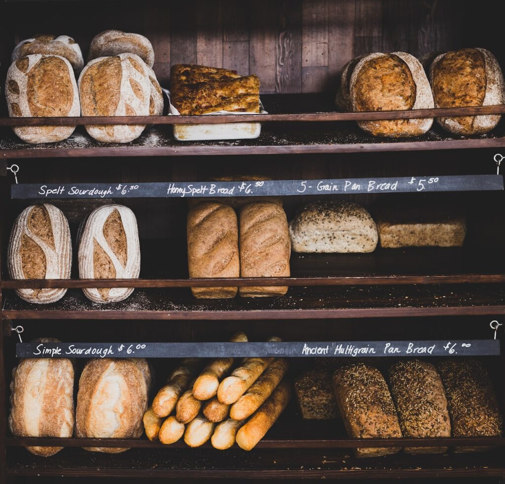 a stand selling various artisan baked breads