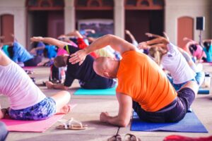 a group of people in a yoga class